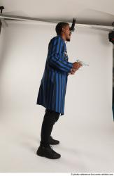 Garson STANDING POSE WITH KATANA AND TWO GUNS